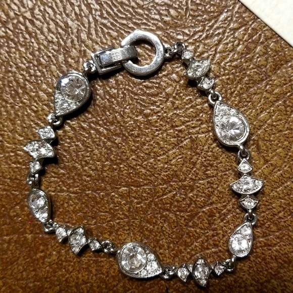 Givenchy silvertone and rhinestone tennis bracelet - Picture 5 of 7